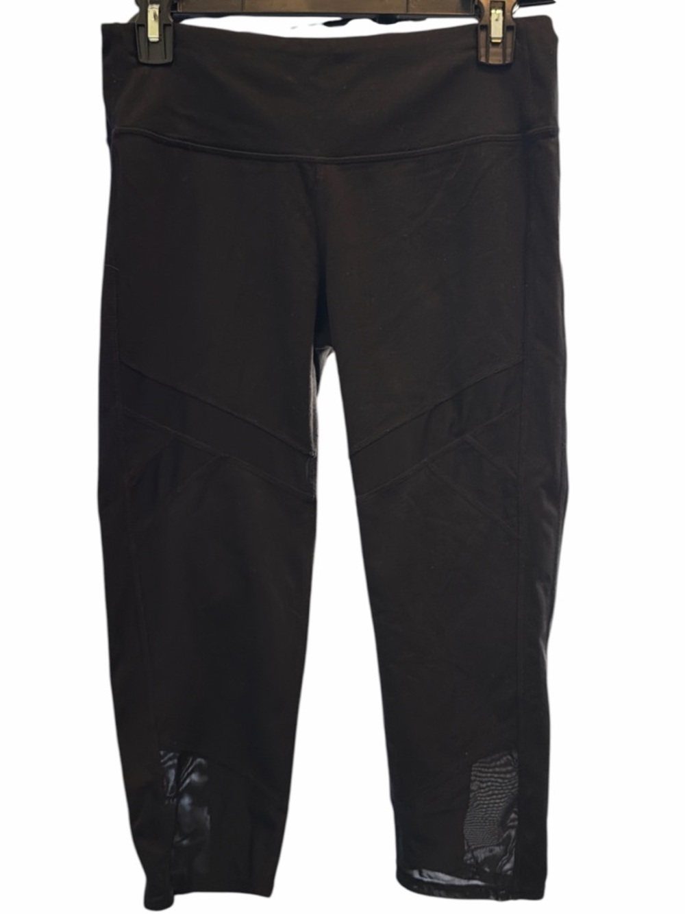 Athleta black Capri leggings with mesh detailing at the calves  EC Size medium